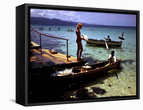 December 1946: Woman and Fishermen at Doctor's Cave Beach in Montego Bay, Jamaica-Eliot Elisofon-Framed Premier Image Canvas