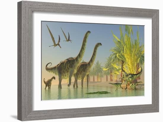 Deinocheirus Dinosaurs Watch a Group of Argentinosaurus Walk Through Shallow Waters-null-Framed Art Print