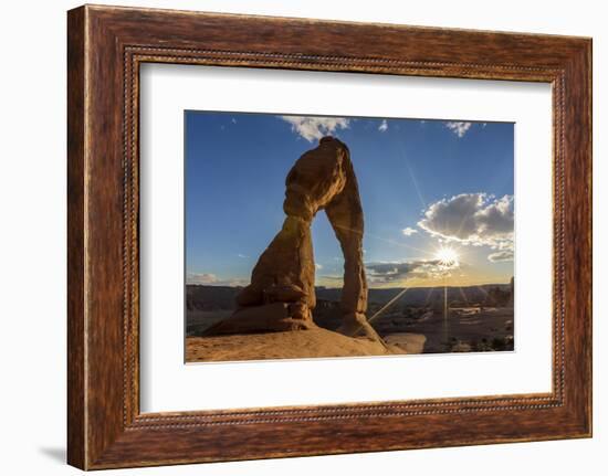 Delicate Arch with sun and clouds at golden hour, Arches National Park, Moab, Grand County, Utah, U-Francesco Vaninetti-Framed Photographic Print