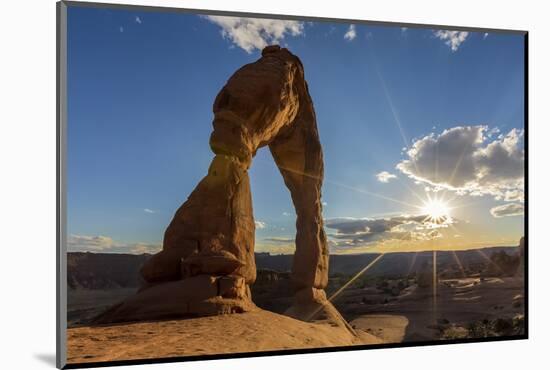 Delicate Arch with sun and clouds at golden hour, Arches National Park, Moab, Grand County, Utah, U-Francesco Vaninetti-Mounted Photographic Print