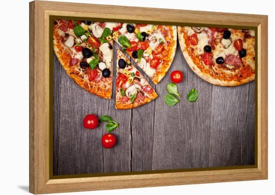 Delicious Italian Pizzas Served on Wooden Table-Jag_cz-Framed Premier Image Canvas