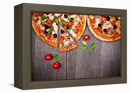 Delicious Italian Pizzas Served on Wooden Table-Jag_cz-Framed Premier Image Canvas