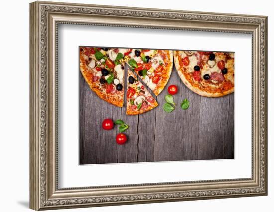 Delicious Italian Pizzas Served on Wooden Table-Jag_cz-Framed Photographic Print