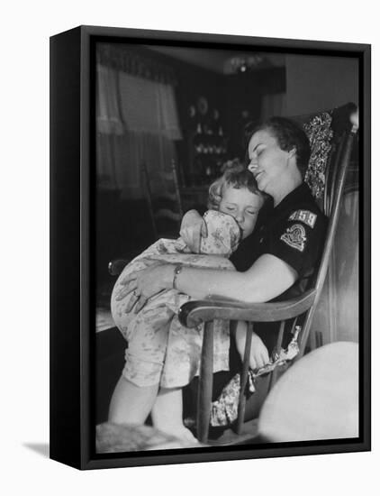 Den Mother Still in Uniform, Sleeping While Holding Her Daughter-null-Framed Premier Image Canvas