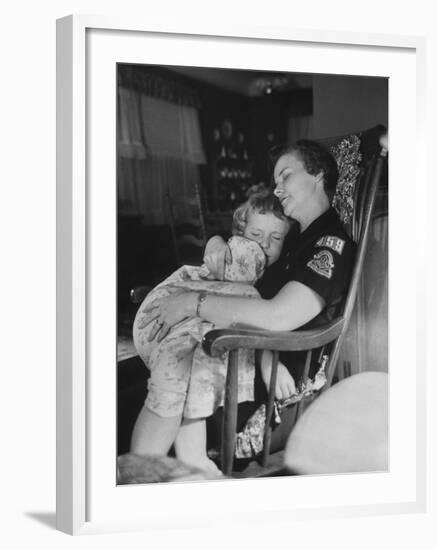 Den Mother Still in Uniform, Sleeping While Holding Her Daughter-null-Framed Photographic Print