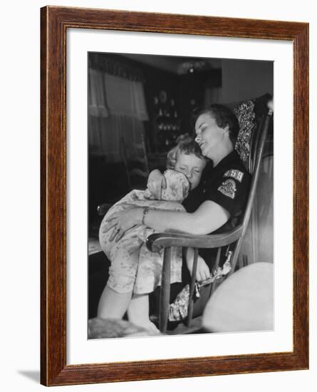 Den Mother Still in Uniform, Sleeping While Holding Her Daughter-null-Framed Photographic Print