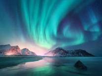 Aurora Borealis over the Sea, Snowy Mountains and City Lights at Night. Northern Lights in Lofoten-Denis Belitsky-Photographic Print