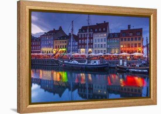 Denmark, Zealand, Copenhagen, Nyhavn Harbor, Evening-Walter Bibikow-Framed Premier Image Canvas