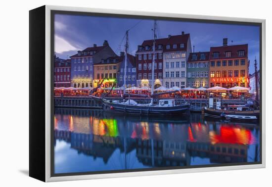 Denmark, Zealand, Copenhagen, Nyhavn Harbor, Evening-Walter Bibikow-Framed Premier Image Canvas