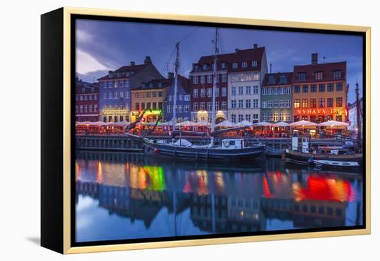 Denmark, Zealand, Copenhagen, Nyhavn Harbor, Evening-Walter Bibikow-Framed Premier Image Canvas