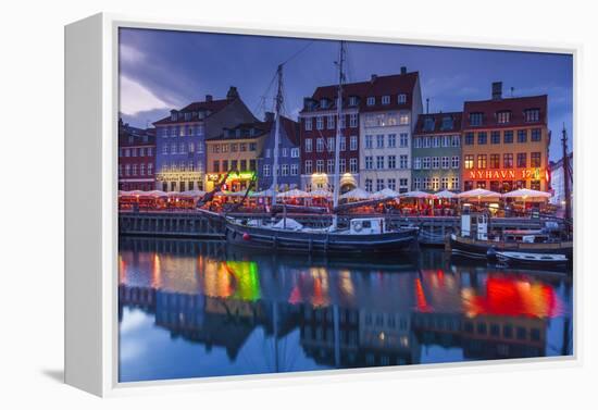 Denmark, Zealand, Copenhagen, Nyhavn Harbor, Evening-Walter Bibikow-Framed Premier Image Canvas