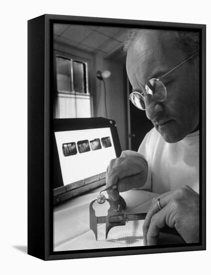 Dentist Dr. Harland Measuring Tooth to Be Used in Medical Dentistry-J^ R^ Eyerman-Framed Premier Image Canvas