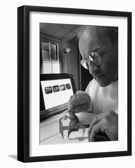Dentist Dr. Harland Measuring Tooth to Be Used in Medical Dentistry-J^ R^ Eyerman-Framed Photographic Print