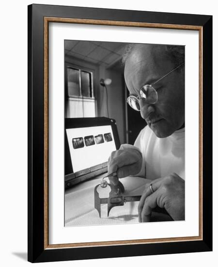 Dentist Dr. Harland Measuring Tooth to Be Used in Medical Dentistry-J^ R^ Eyerman-Framed Photographic Print