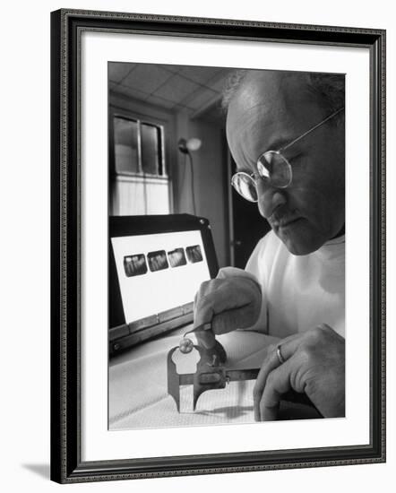 Dentist Dr. Harland Measuring Tooth to Be Used in Medical Dentistry-J^ R^ Eyerman-Framed Photographic Print