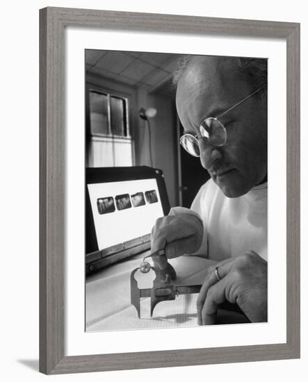 Dentist Dr. Harland Measuring Tooth to Be Used in Medical Dentistry-J^ R^ Eyerman-Framed Photographic Print