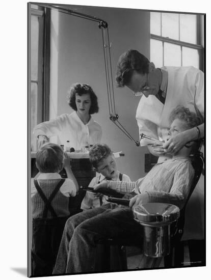 Dentist Examining a Young Boy-Nina Leen-Mounted Photographic Print