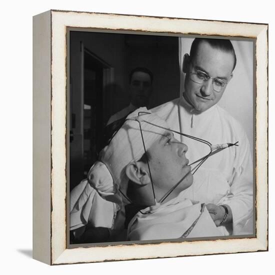 Dentist Working on a Soldier's Mouth at the Ft. Meade and Walter Reed Dental Hospital-George Strock-Framed Premier Image Canvas