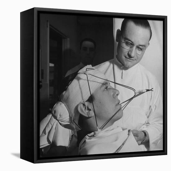 Dentist Working on a Soldier's Mouth at the Ft. Meade and Walter Reed Dental Hospital-George Strock-Framed Premier Image Canvas