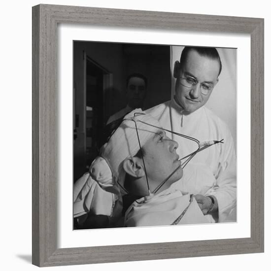 Dentist Working on a Soldier's Mouth at the Ft. Meade and Walter Reed Dental Hospital-George Strock-Framed Photographic Print