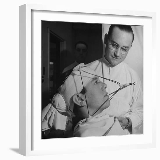 Dentist Working on a Soldier's Mouth at the Ft. Meade and Walter Reed Dental Hospital-George Strock-Framed Photographic Print