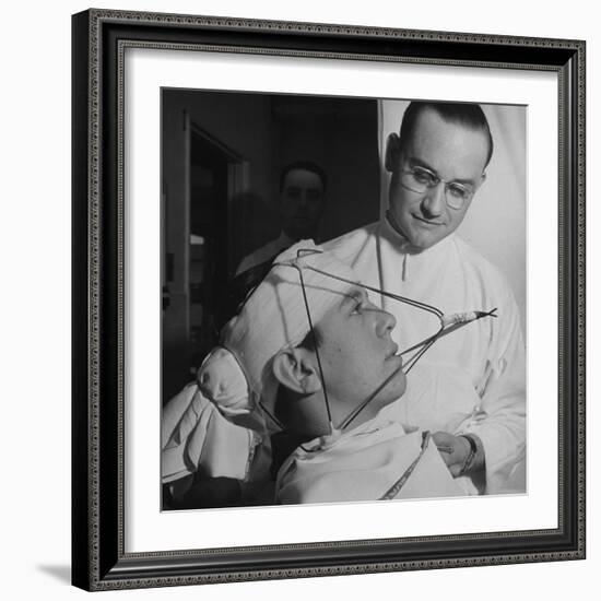 Dentist Working on a Soldier's Mouth at the Ft. Meade and Walter Reed Dental Hospital-George Strock-Framed Photographic Print