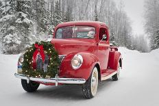 Man Driving A Vintage 1941 Ford Pickup With A Christmas Wreath On The Front During Winter-Design Pics-Mounted Photographic Print