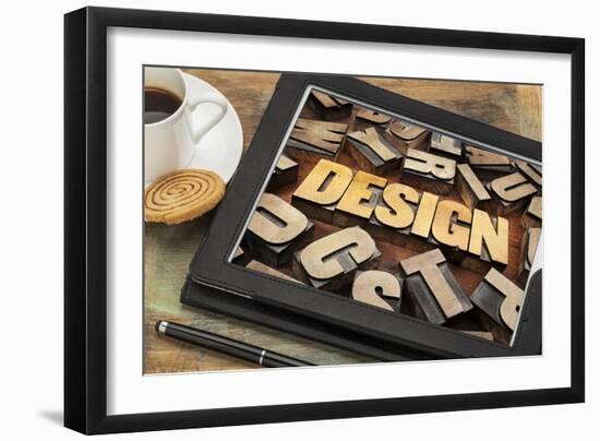 Design Word Abstract in Letterpress Wood Type on a Digital Tablet with Cup of Coffee-PixelsAway-Framed Art Print