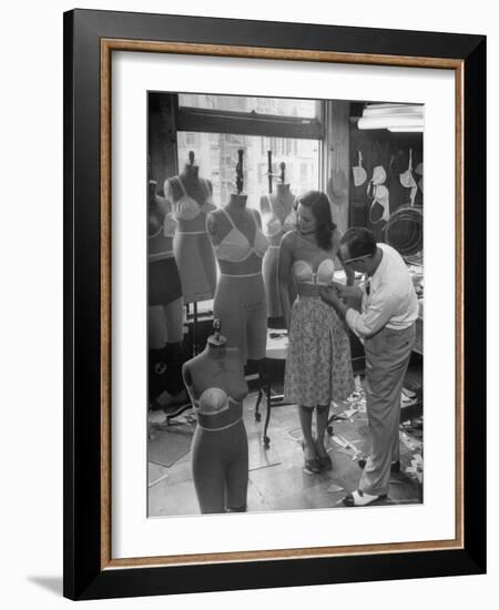 Designer Jack Glick Fitting a Strapless Bra on Model-Nina Leen-Framed Photographic Print