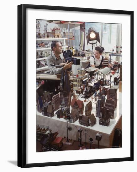 Designers Charles Eames and Wife Ray Eames Filming Toy Trains at Their Studio-Allan Grant-Framed Premium Photographic Print