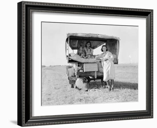 Destitute Texan family leave their home to seek work in Arkansas cotton fields, 1936-Dorothea Lange-Framed Photographic Print