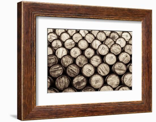 Detail Monochrome View of Stacked Wine and Whisky Wooden Barrels-MartinM303-Framed Photographic Print