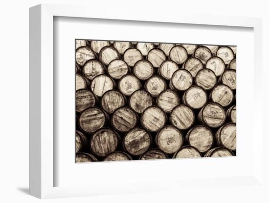 Detail Monochrome View of Stacked Wine and Whisky Wooden Barrels-MartinM303-Framed Photographic Print