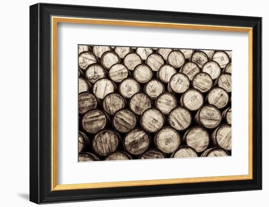 Detail Monochrome View of Stacked Wine and Whisky Wooden Barrels-MartinM303-Framed Photographic Print