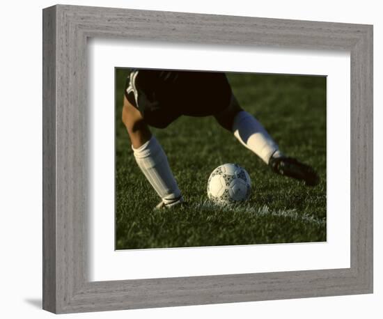 Detail of Foot About to Kick a Soccer Ball-Paul Sutton-Framed Photographic Print