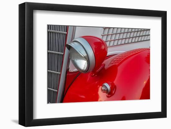 Detail of head lamp on red classic American Ford in Habana, Havana, Cuba.-Janis Miglavs-Framed Photographic Print