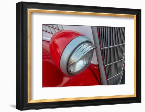 Detail of head light and grill on red classic American Ford in Habana, Havana, Cuba.-Janis Miglavs-Framed Photographic Print