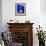 Detail of Potted Plant Against Blue Wall-Stephen Studd-Framed Photographic Print displayed on a wall