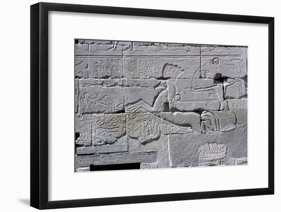 Detail of relief of Pharaoh in chariot riding down his enemies, Temple of Amun, Karnak, c1400 BC-Unknown-Framed Giclee Print