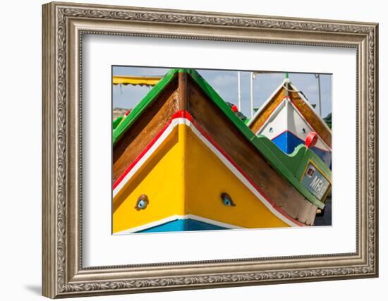 Detail of traditional brightly painted fishing boat in the harbour at Marsaxlokk, Malta, Mediterran-Martin Child-Framed Photographic Print