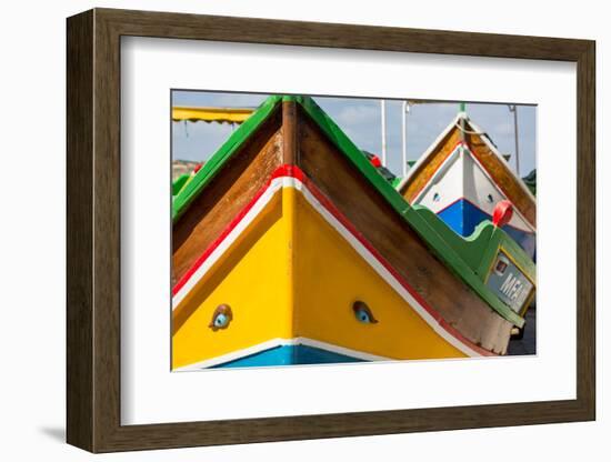 Detail of traditional brightly painted fishing boat in the harbour at Marsaxlokk, Malta, Mediterran-Martin Child-Framed Photographic Print