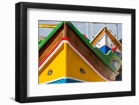 Detail of traditional brightly painted fishing boat in the harbour at Marsaxlokk, Malta, Mediterran-Martin Child-Framed Photographic Print