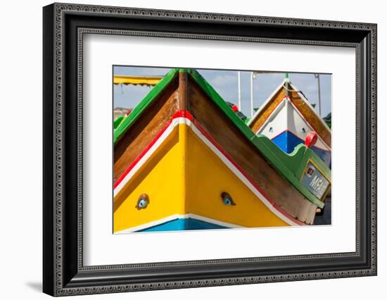 Detail of traditional brightly painted fishing boat in the harbour at Marsaxlokk, Malta, Mediterran-Martin Child-Framed Photographic Print