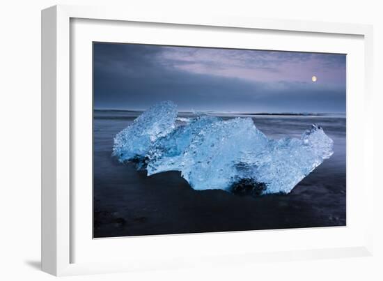 Detailed Image Of Iceberg On The Black Sand Beach, Under A Dramtic Sky At Jokulsarlon, Iceland-Joe Azure-Framed Photographic Print