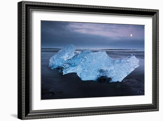 Detailed Image Of Iceberg On The Black Sand Beach, Under A Dramtic Sky At Jokulsarlon, Iceland-Joe Azure-Framed Photographic Print