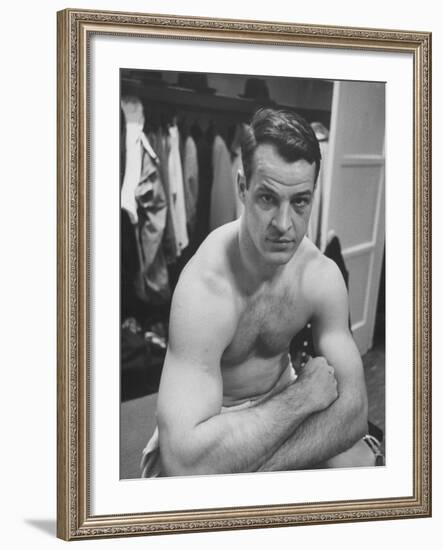 Detroit Red Wings Player Gordie Howe Sitting in the Dressing Room-null-Framed Premium Photographic Print