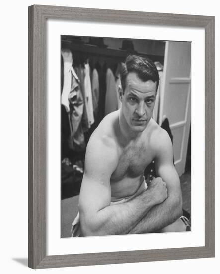 Detroit Red Wings Player Gordie Howe Sitting in the Dressing Room-null-Framed Premium Photographic Print