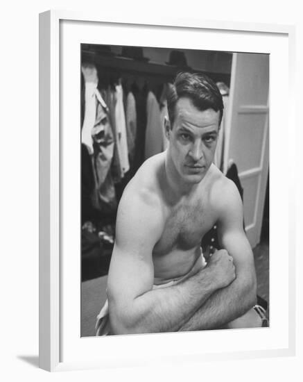 Detroit Red Wings Player Gordie Howe Sitting in the Dressing Room-null-Framed Premium Photographic Print