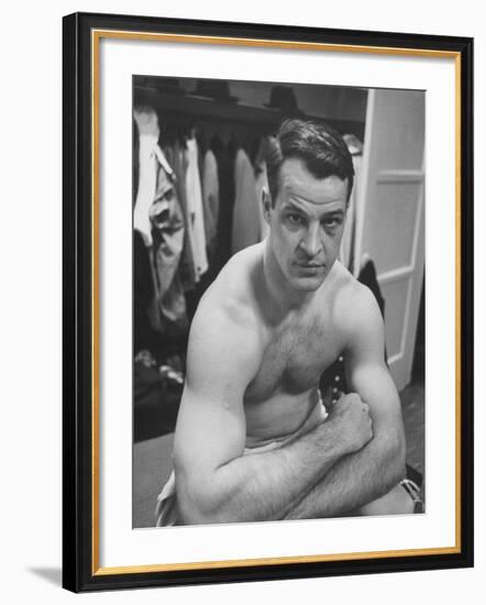 Detroit Red Wings Player Gordie Howe Sitting in the Dressing Room-null-Framed Premium Photographic Print