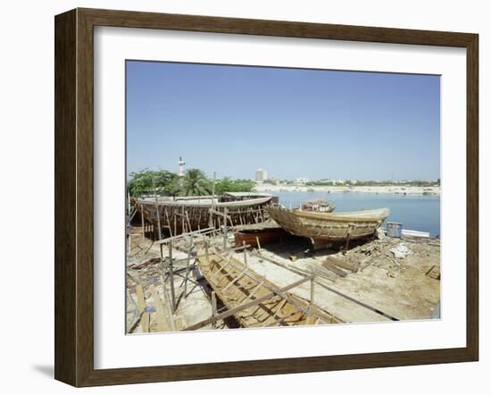 Dhows are still constructed using the traditional methods at Ajman wharf-Werner Forman-Framed Giclee Print